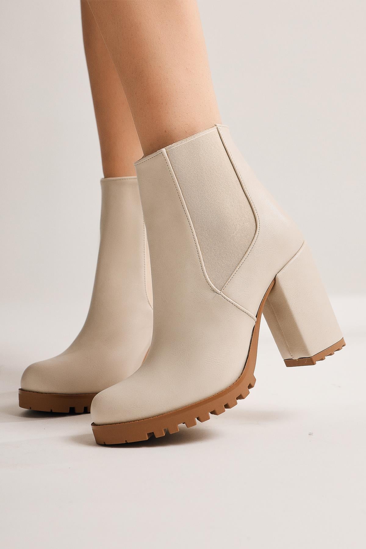 Dorsaf Beige Oval Toe Elastic Heeled Boots