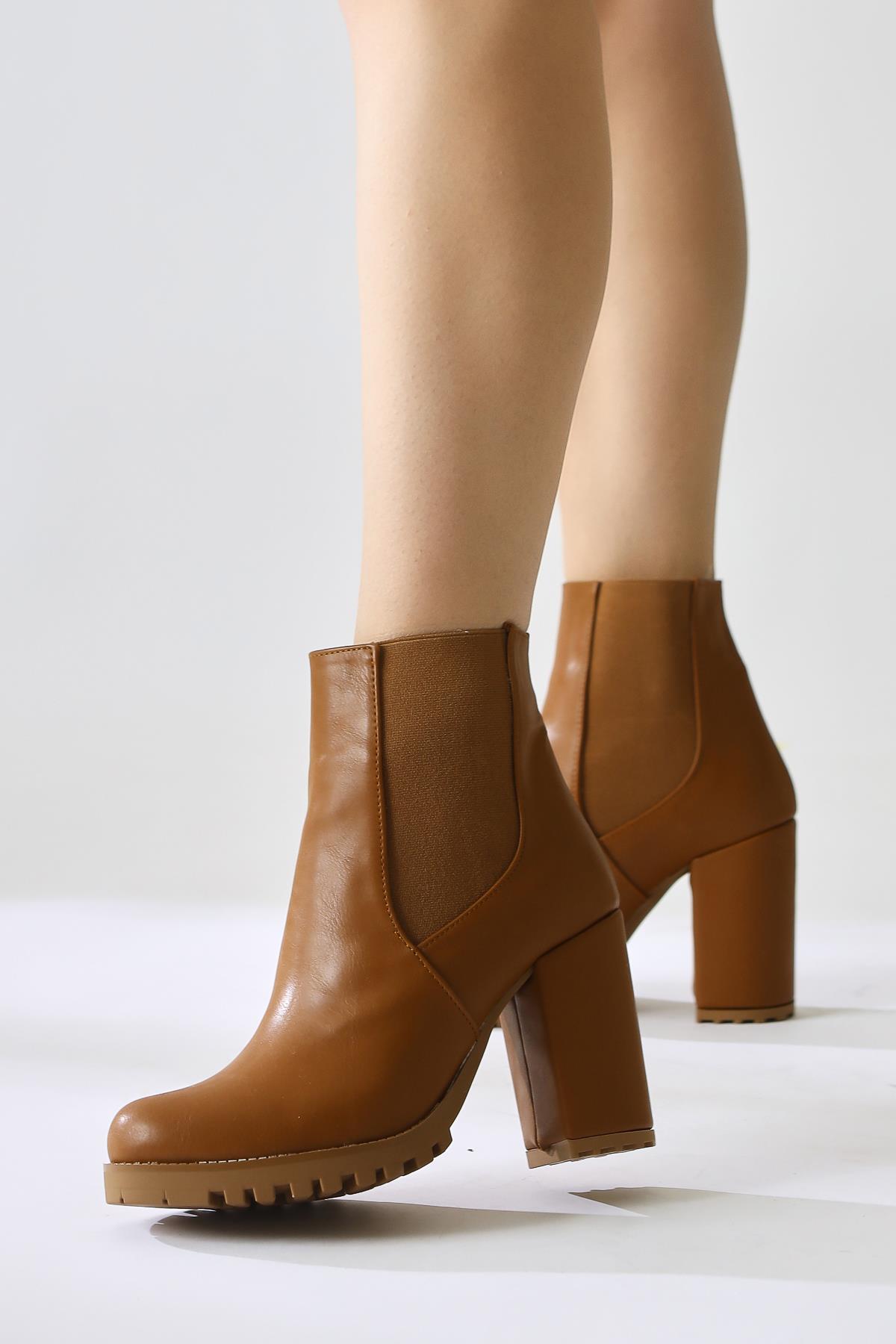 Dorsaf Tan Oval Toe Elastic Heeled Boots