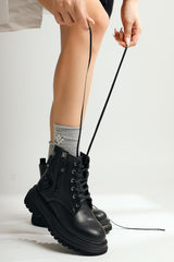 Esta Black Zippered Boots with Staple Detail