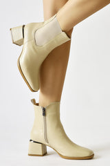 Galya Beige Wrinkled Patent Leather Low Heeled Pull-On Boots