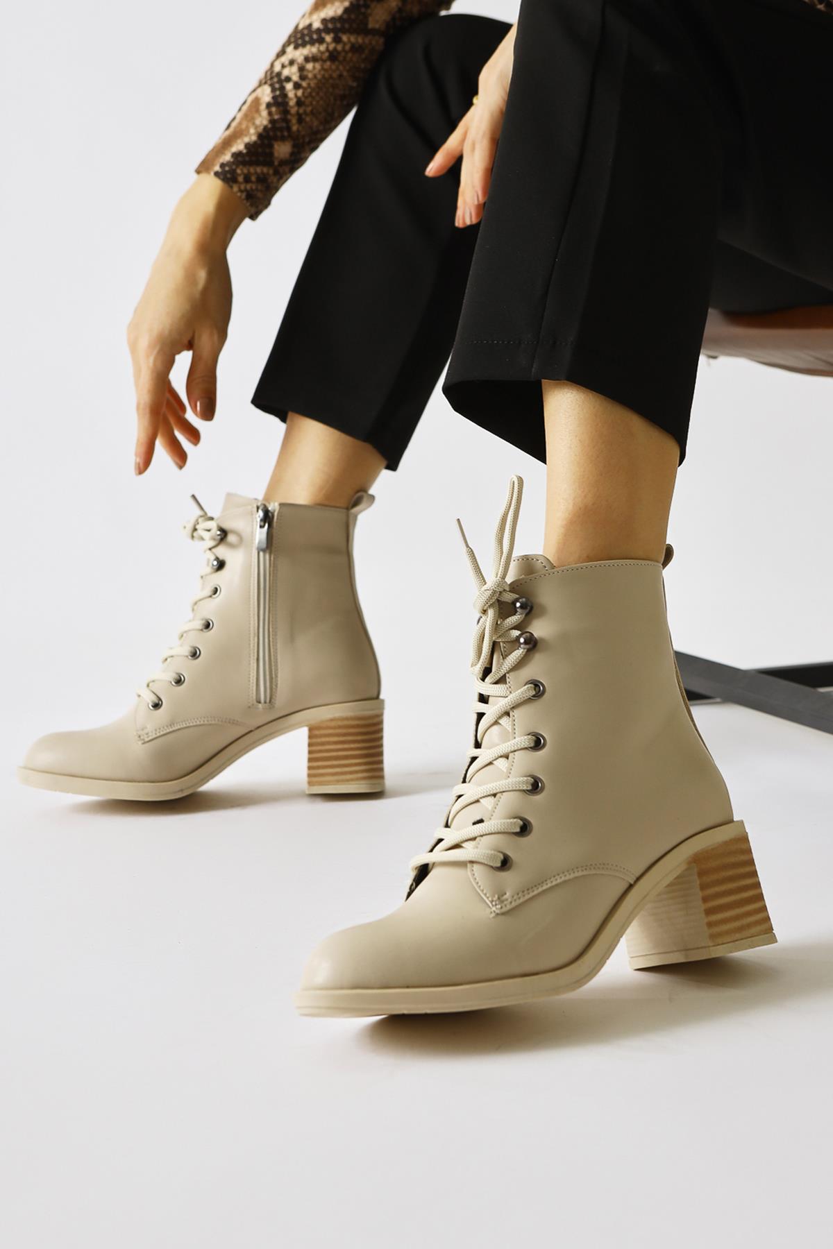 Lonny Nej Oval Toe Lace-Up and Zippered Heeled Boots