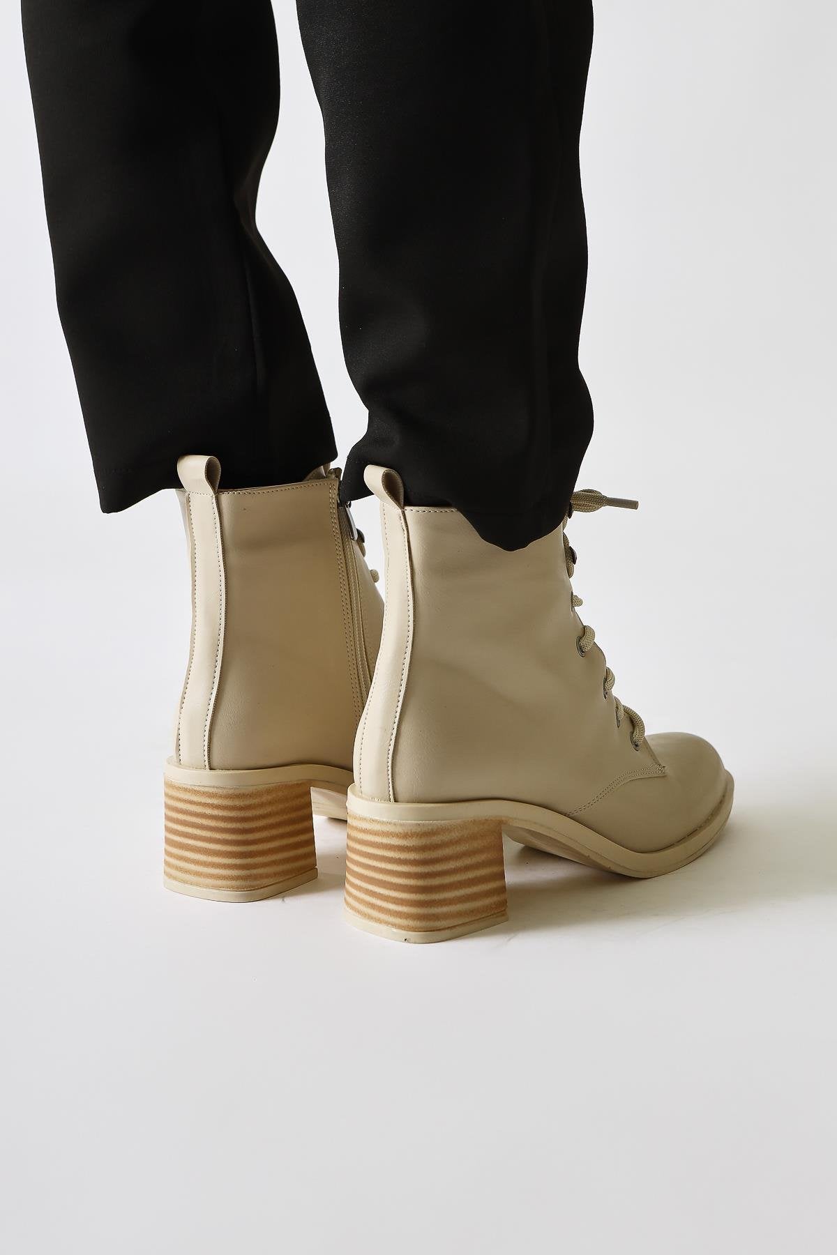 Lonny Nej Oval Toe Lace-Up and Zippered Heeled Boots